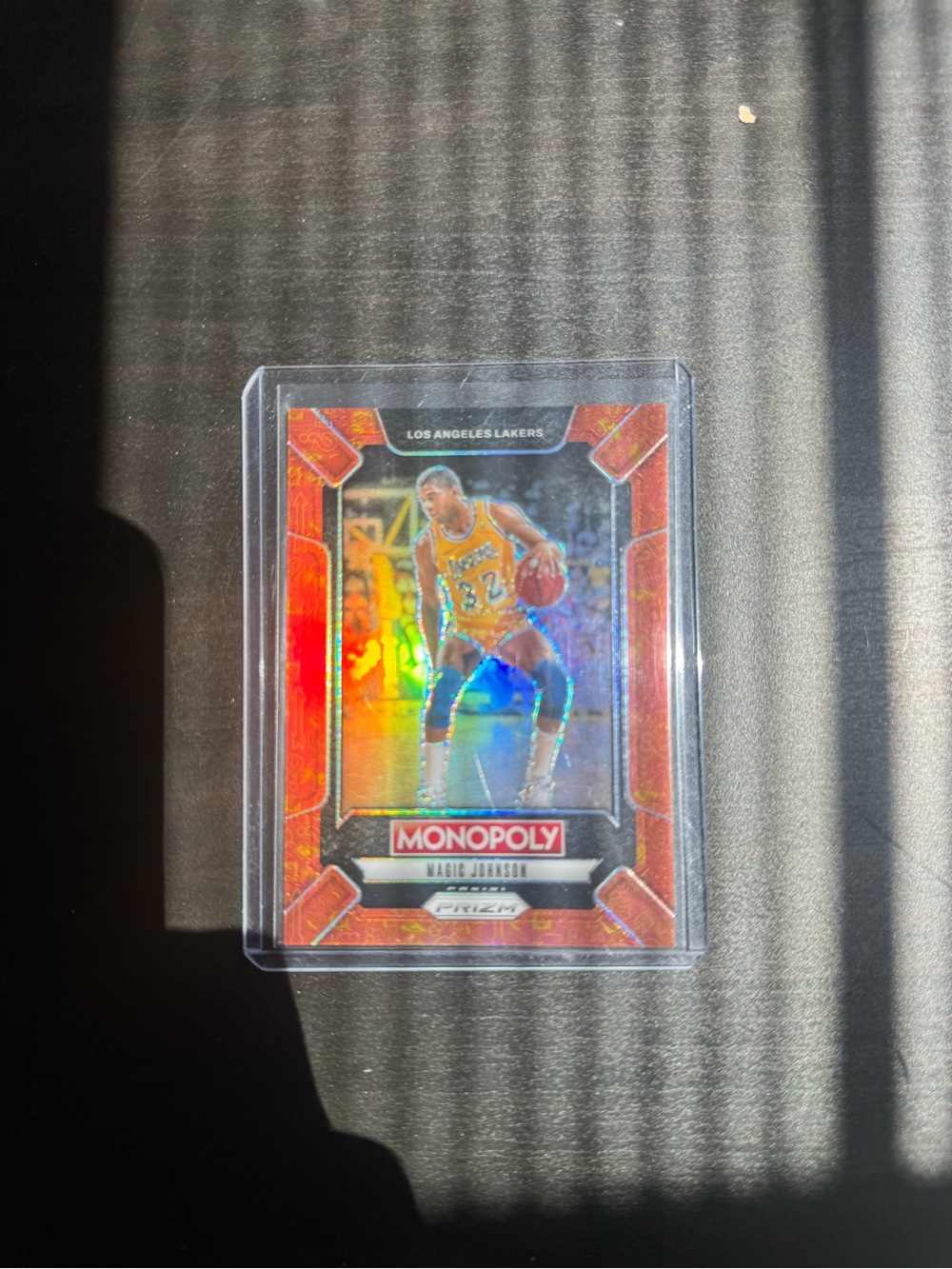 2024-25 Panini Prizm Monopoly Magic Johnson Classic Icons Orange Prizm /1499